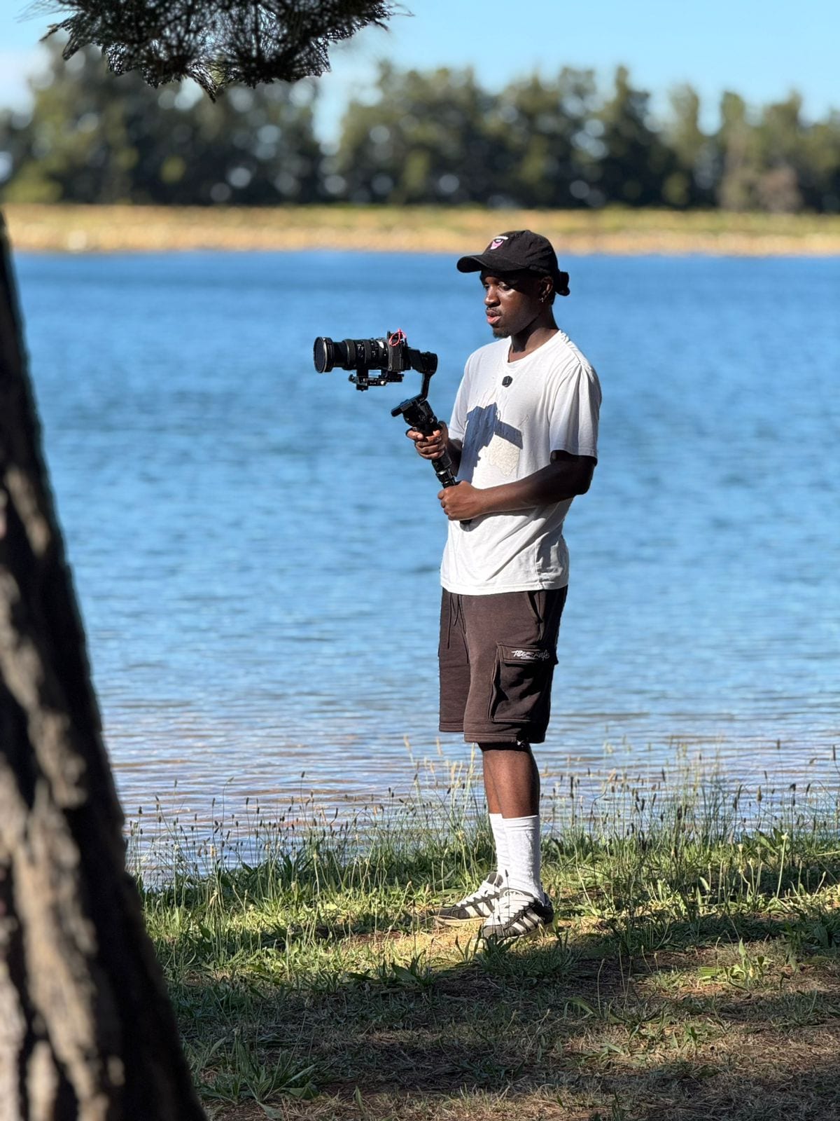 Jefte filming by the lake with gimbal